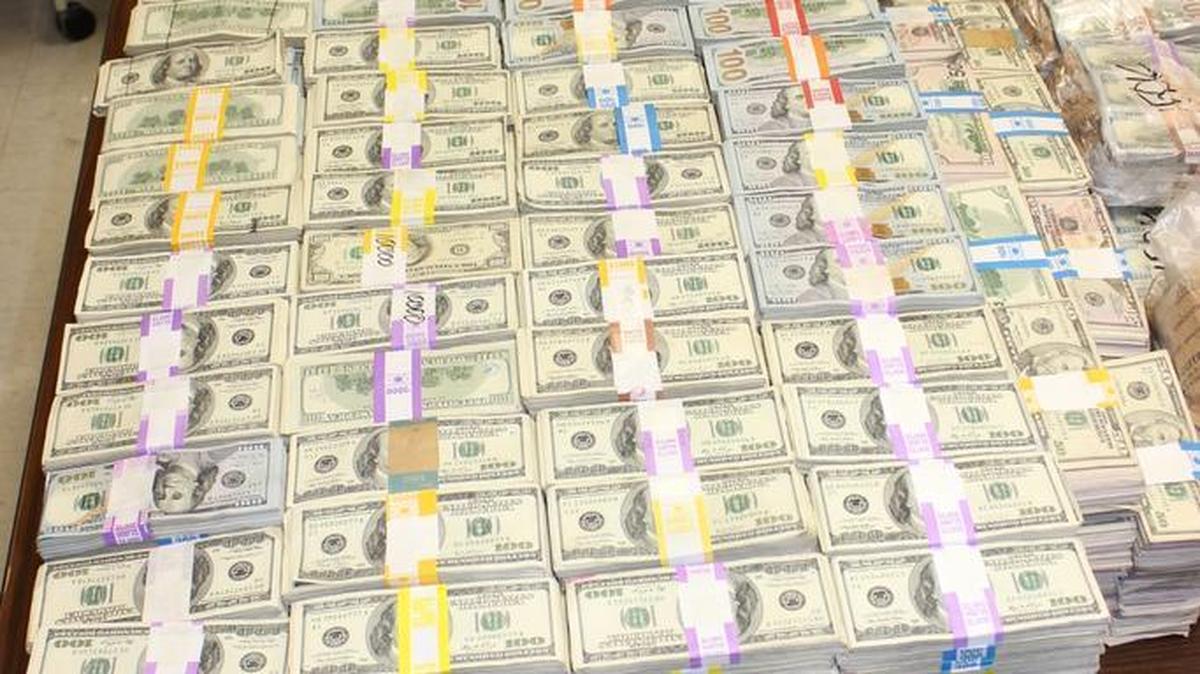More than $22 million in suspected drug cash found in orange buckets inside the Miami Lakes home of Luis Hernandez-Gonzalez. He was asking a court to return the money, arguing it was lawfully earned through a legitimate indoor gardening equipment business.
