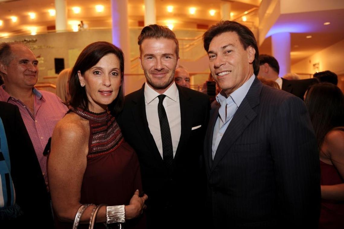 From left, Andrea Greenberg, David Beckham and Edgardo Defortuna, photographed at an event on Feb. 4, 2014.