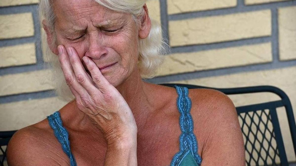 Janet Goode is overcome with emotion as she talks about her adopted daughter, Moriah Hope Goode, who was the victim of a fatal shooting Sunday.