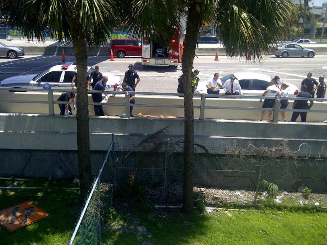 CAUSEWAY CANNIBAL SCENE: This was the scene on a walkway along the MacArthur Causeway, which connects the downtown Miami with Watson Island and Miami Beach, on Memorial Day, Saturday, May 26, after an attacker named Rudy Eugene beat and gnawed away most of the face of homeless man Ronald Poppo.