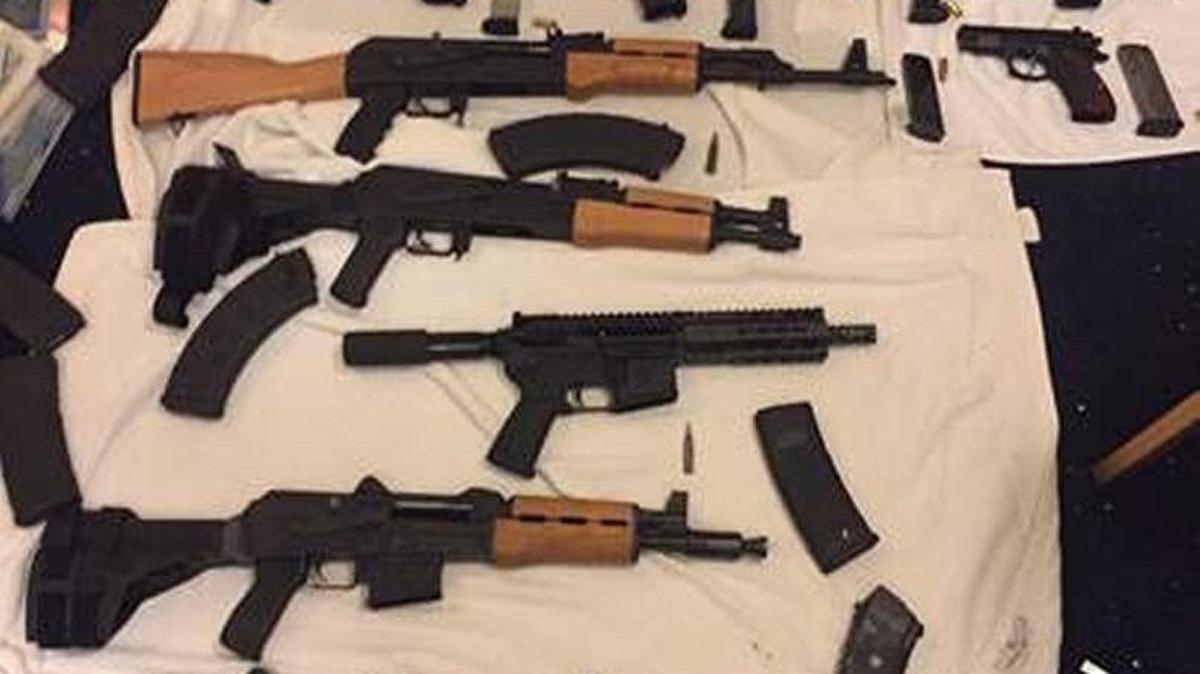 Weapons found by Miami Beach police inside the home of Ricky Weinberger, 54, who is accused of theatening officers.