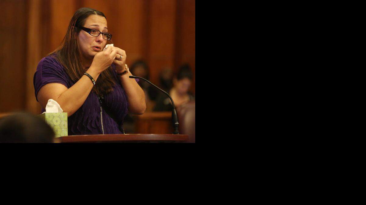 
Jaquelyn Parrish speaks of her younger stepbrother, Julian Soler, at the sentencing hearing of Eric Ellington Friday, Sept. 19, 2014. Ellington was convicted of brutal double slaying of Soler and his girlfriend Kennia Duran at Miami Gardens gas station in July 2011.
