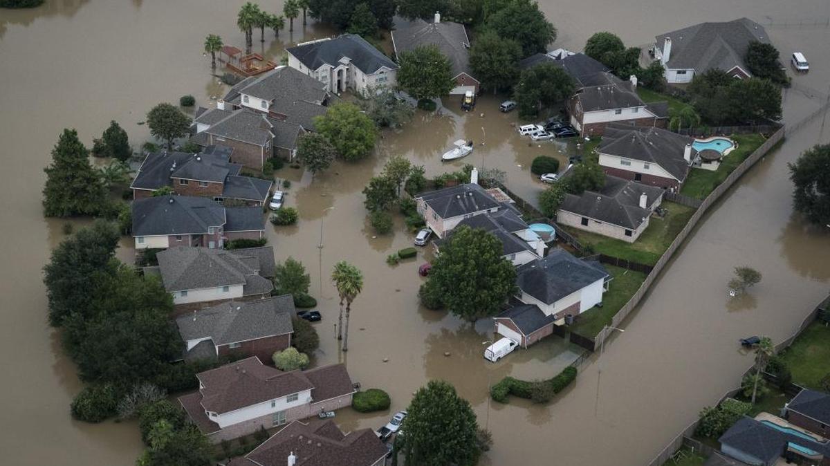 Flood water surrounds houses and apartment complexes in West Houston.
