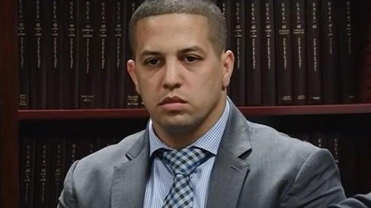 Adrian Rodriguez, pictured here at an arbitration hearing for his firing from his job as a Miami police officer. He is being investigated for his role in a decade-old homicide. An arbitrator last month ruled he deserved to have his job back.