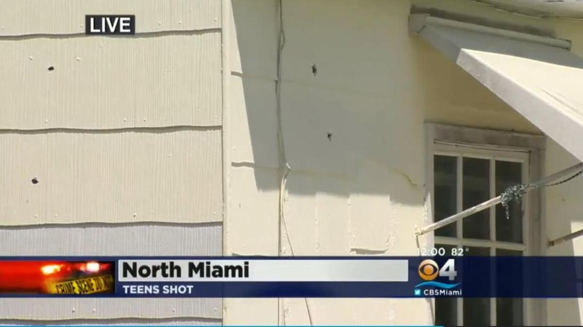 
The North Miami home where 15-year-old twin sisters were shot is riddled with bullet holes.
