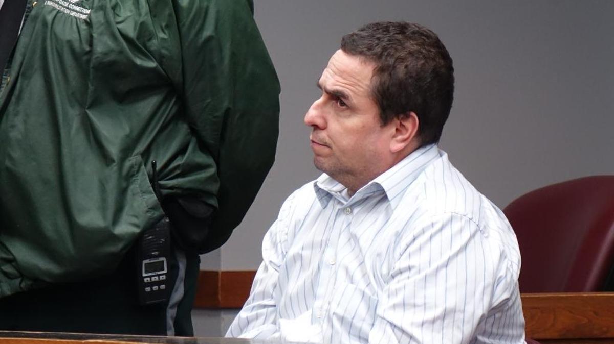 John Paul Garcia, 47, in Miami-Dade court Thursday as he stands trial for the suspected June 2013 murder of Larissa Macriello. Her body was never been found.