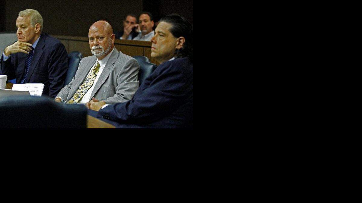 
Stuart Rosenfeldt, center, in court in 2009.
