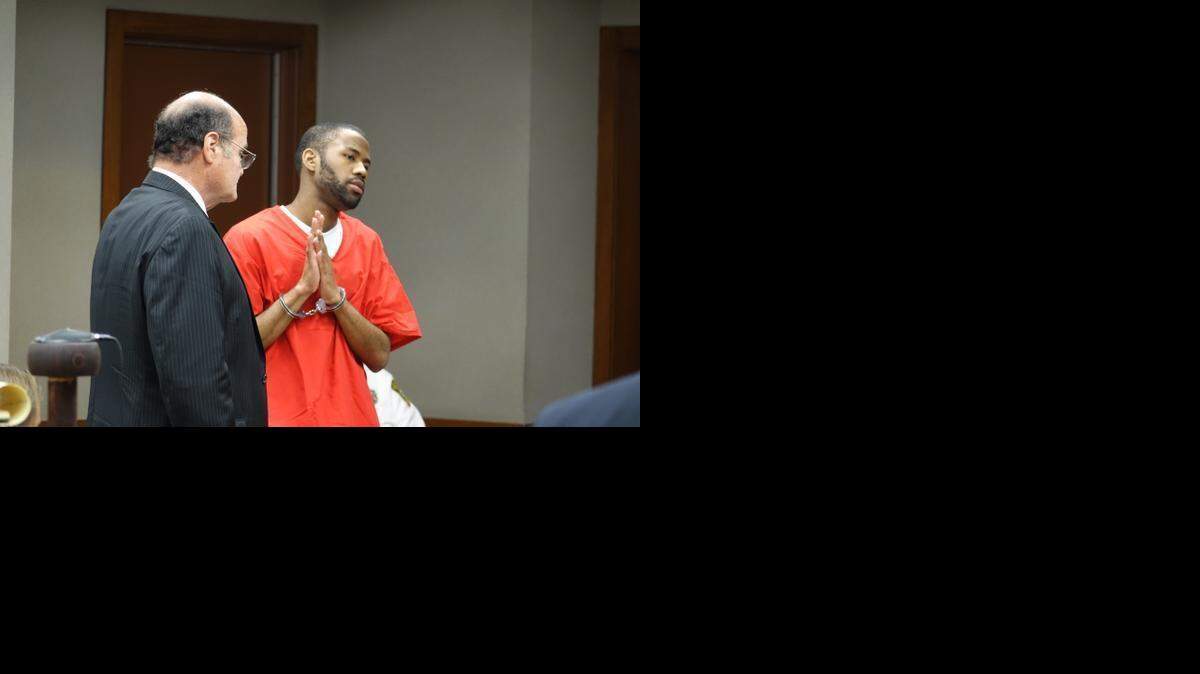 
Rayon Samuels stands next to his lawyer, Jeffrey Weinkle, as he pleads guilty to his role in October 2006 shooting at a child’s birthday party.
