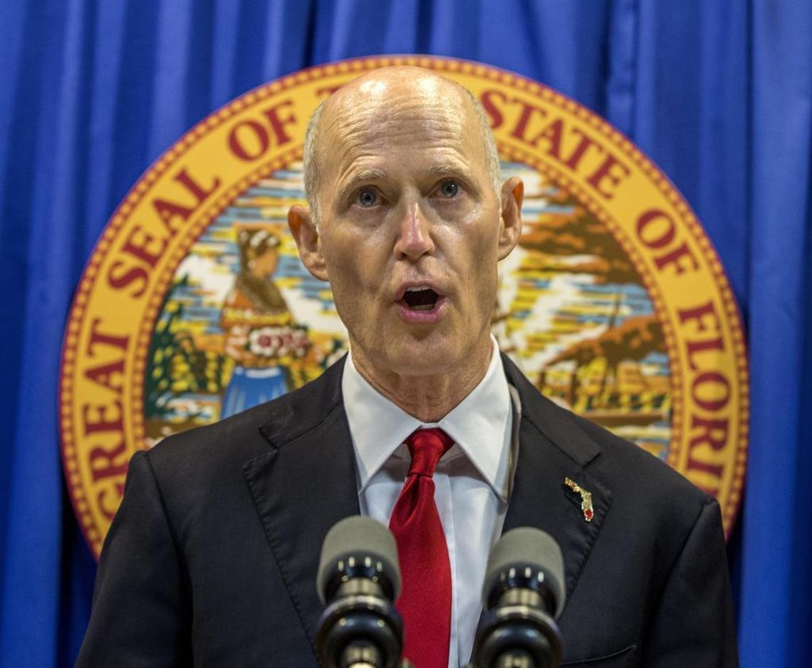 Florida Gov. Rick Scott lays out his school safety proposal during a news conference at the Florida Capitol in Tallahassee on Friday, Feb 23, 2018. Scott proposed banning the sale of firearms to anyone younger than 21 as part of a plan to prevent gun violence.