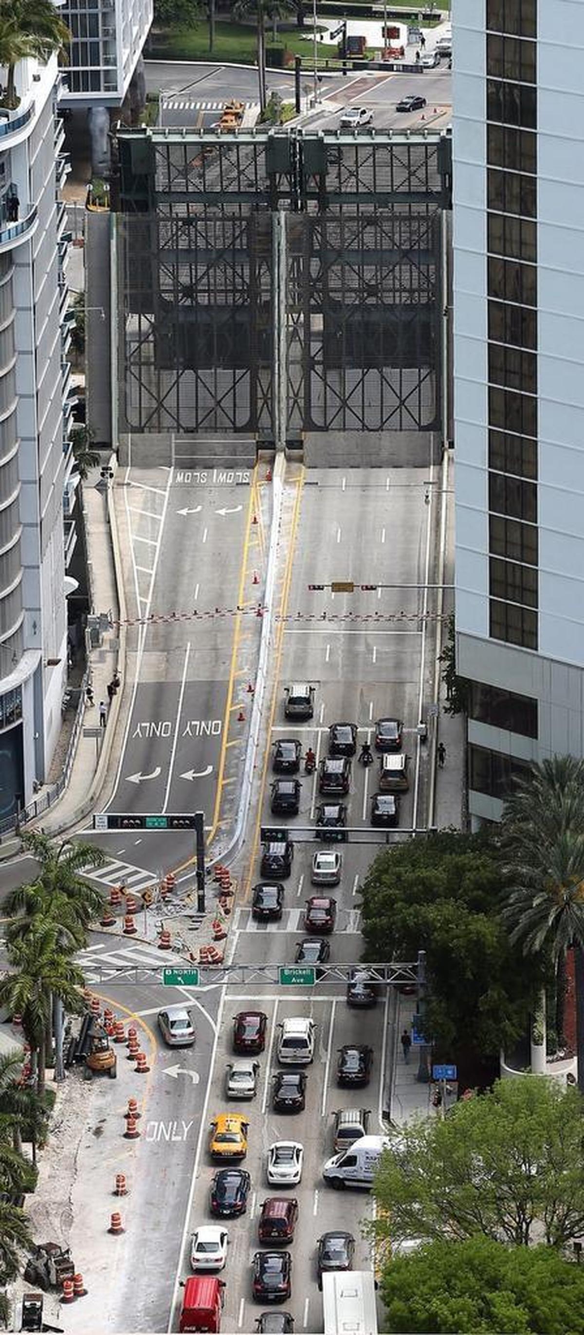 Traffic backs up at the Brickell Avenue Bridge in downtown Miami, where openings for boat traffic are the source of increasing controversy.