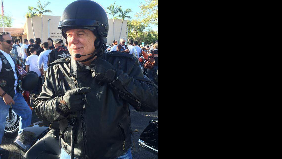 
Archbishop’s 2015 Porker Run: Archbishop Thomas Wenski puts on his biking gear as he and members of the motorcycling community participate in 2015 Archbishop’s Motorcycle Poker Run on Sunday, February 1, starting at Our Lady of the Holy Rosary-St. Richard Catholic Church in south Miami-Dade.
