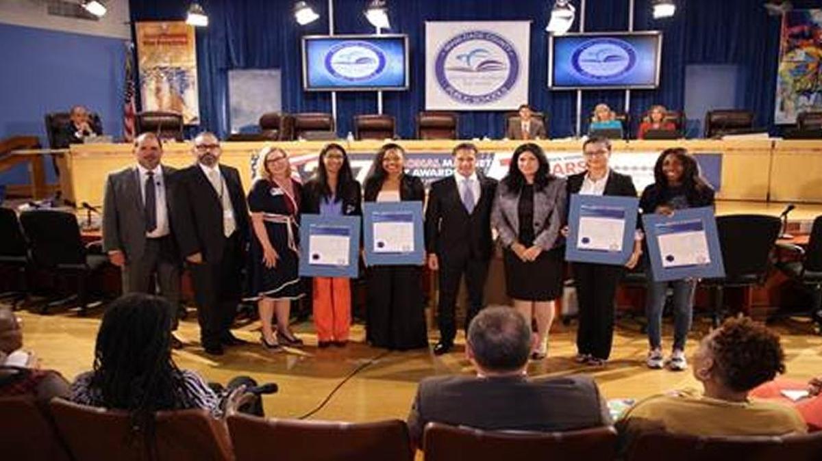Several Miami-Dade County students were named 2018 Junior League of Miami Scholarship recipients. The students were recently honored during a Miami-Dade County Public School Board meeting and are pictured with principals Jose Enriquez and Omar Monteagudo; Junior League of Miami President Helen Picard; Miami-Dade Schools Superintendent Alberto Carvalho; and School Board member Lubby Navarro.