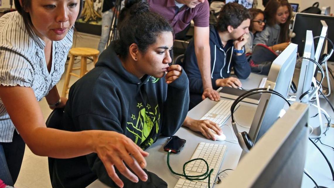 File photo of Students at Alonzo and Tracy Mourning Senior High School. Technology plays a big role in Miami-Dade schools.