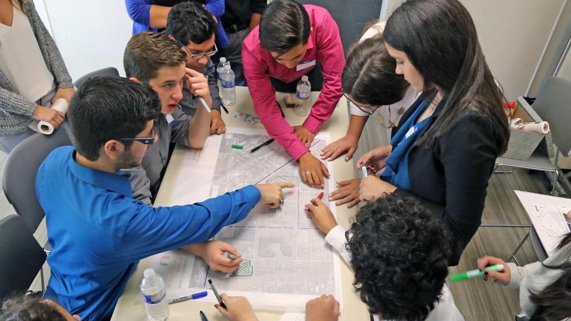 Students in a magnet program at Hialeah Gardens High School work with University of Miami students and faculty to tackle issues such as housing needs and climate change in the neighborhood around the school.