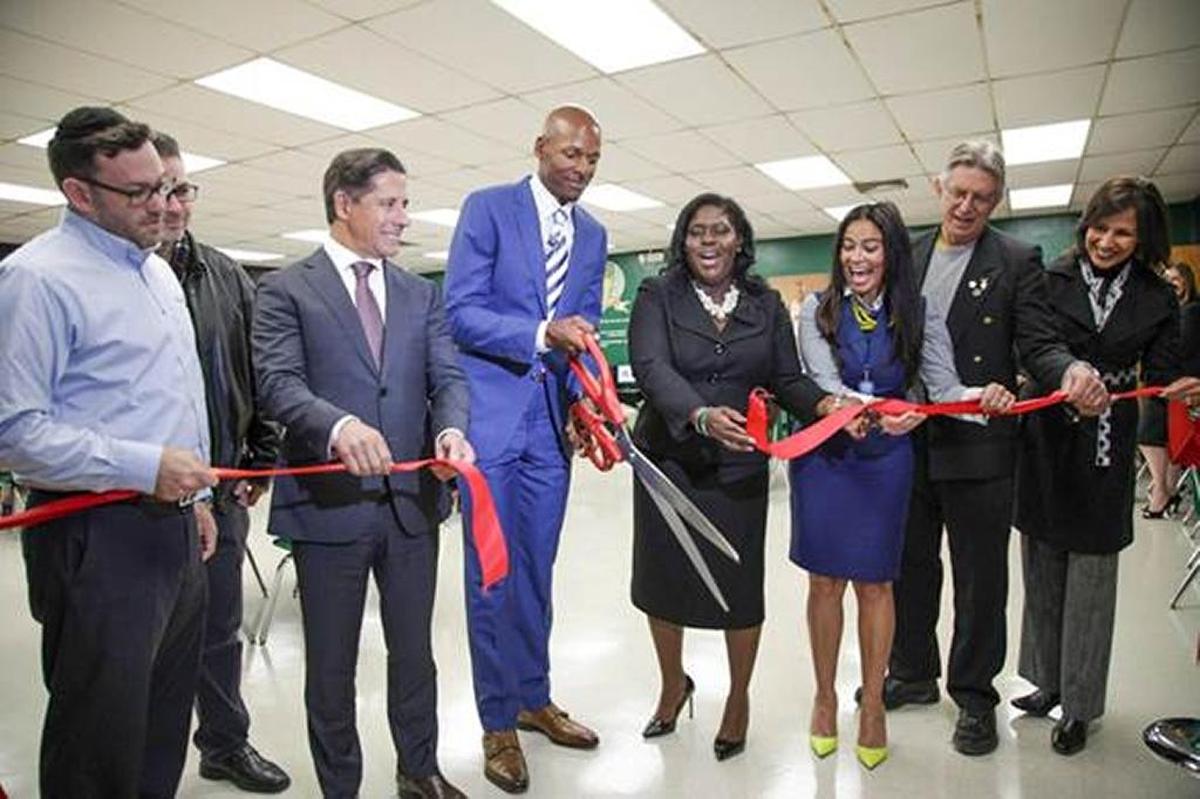 Former Miami Heat basketball player Ray Allen and his Ray of Hope Foundation recently donated a computer lab to Homestead Middle School. Allen is pictured with Miami-Dade County Public Schools’ Superintendent Alberto Carvalho, students, Principal Contessa Bryant, faculty and staff members during the ribbon-cutting ceremony.