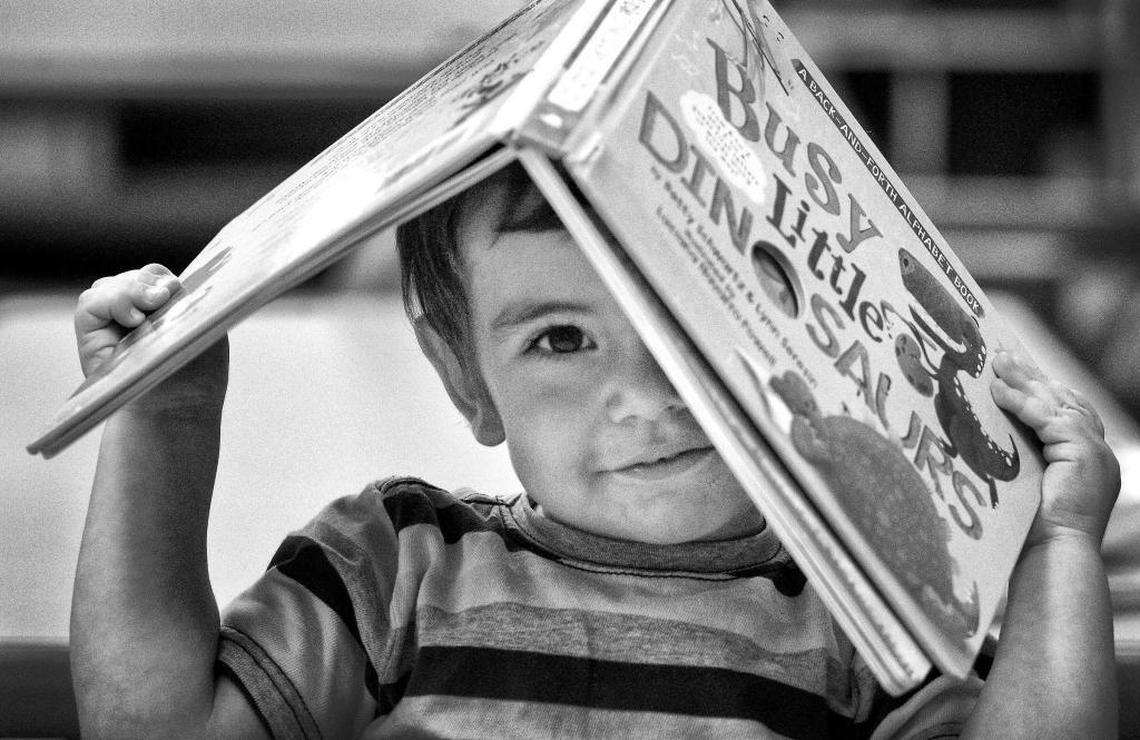 Debbie School student Christopher Pavicic holds on to his favorite book. Reading at the grade level by the third grade can sure success in school and in later life. According to the Early Learning Coalition of Miami-Dade/Monroe: “Early experiences with books lay the foundation for literacy development and books are the window to the world. Reading just 15 minutes a day to a child enhances school readiness.”