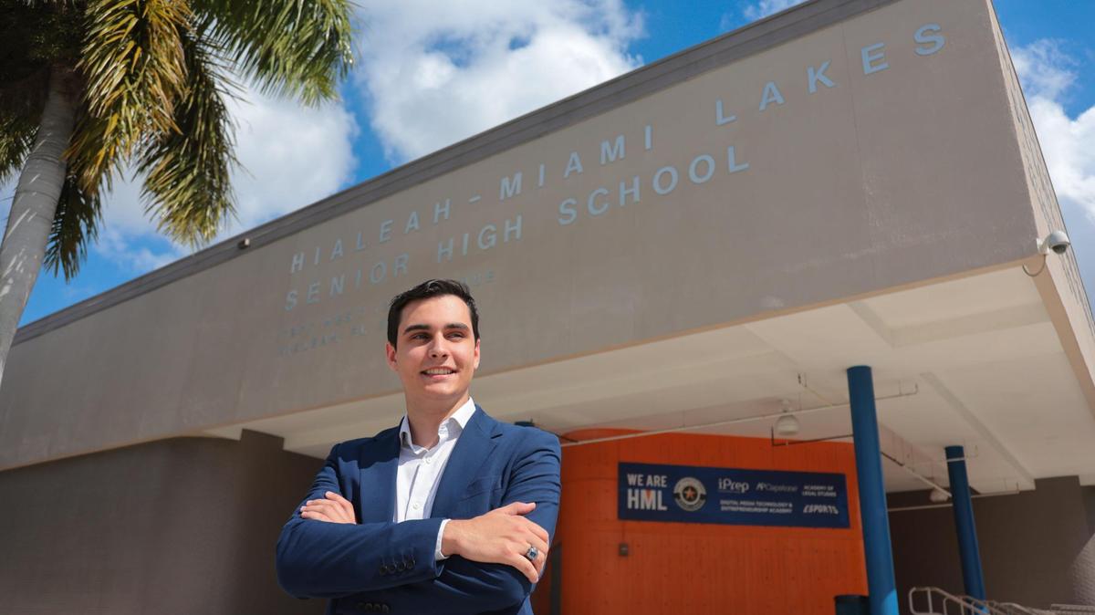 Hialeah-Miami Lakes Senior High School student Maurits Acosta outside the school entrance. Acosta committed to Harvard after receiving acceptances from Yale, Princeton, and Georgetown University.