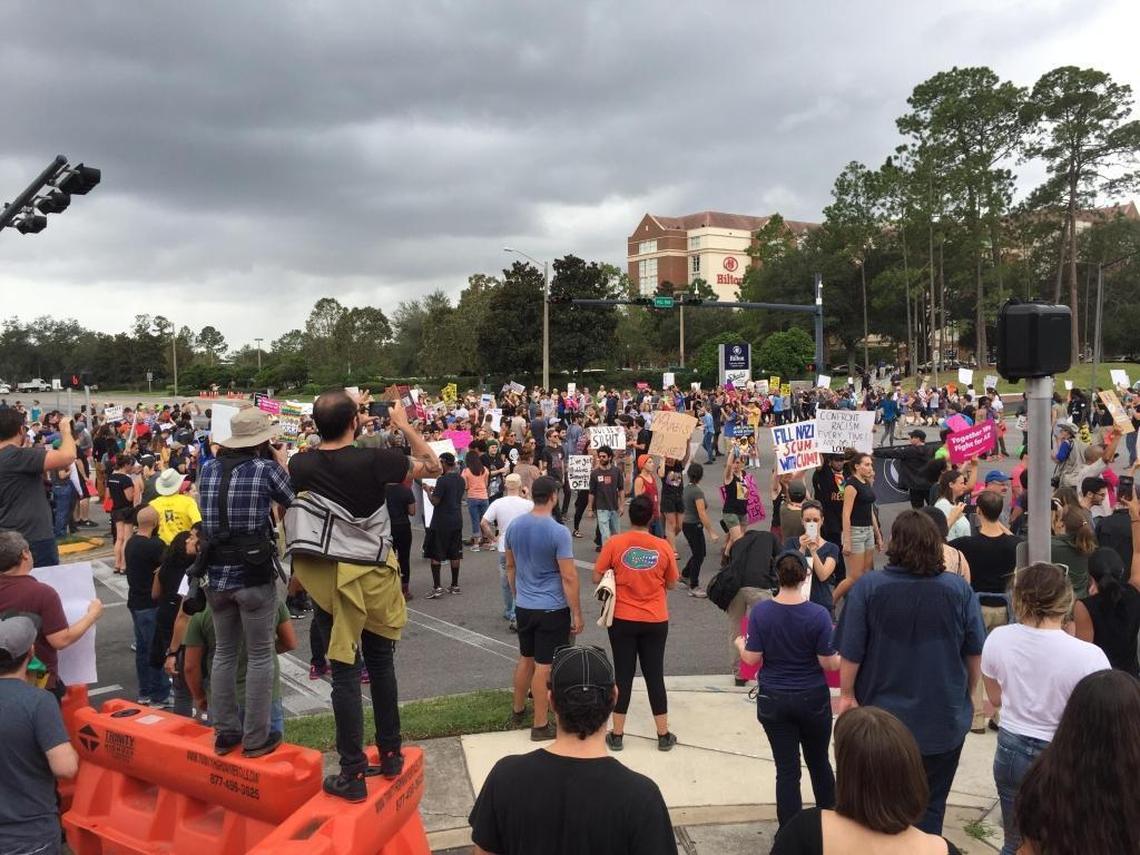 Protesters take over the intersection of Southwest 34th Street and Hull Road at the University of Florida to protest against white nationalist Richard Spencer on Thursday, Oct. 19, 2017.