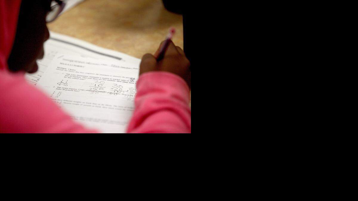 
FILE--Sixth grader Qarleha Williamson, 12, prepares for the FCAT at Brownsville Middle School in Miami, on Saturday, March 21, 2012.
