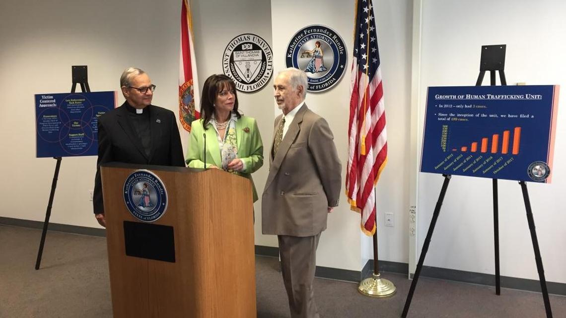 St. Thomas University President Msgr. Franklyn Casale, Miami State Attorney Katherine Fernandez Rundle and John Brunetti discuss Brunetti’s $2.5 million dollar gift to the university’s Human Trafficking Academy.