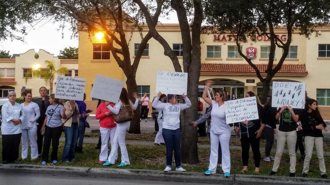 Students protest outside Mattia College, Feb. 19, calling for the school to receive the federal funding it says it needs to stay afloat.