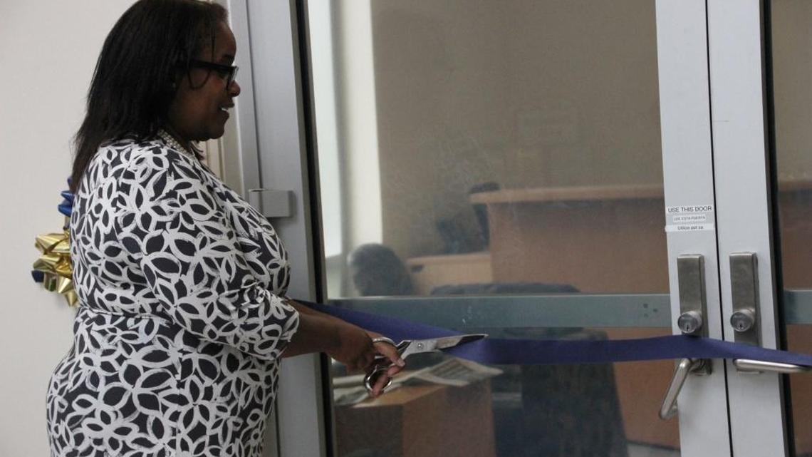 Michelle Mason, senior associate dean of Florida International University’s Law Practice, officially launches the program at a ribbon cutting ceremony on Friday. The program will provide legal services to families who do not qualify for free legal services but still face difficulties affording a lawyer.