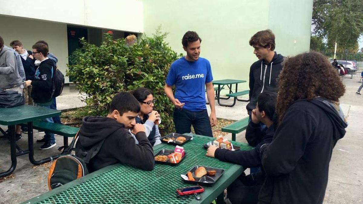 Preston Silverman, 33, wears his Raise.me shirt while visiting Miami Killian Senior High School to spread the word about the program’s benefits, including the micro-scholarships students can earn for good achievements.