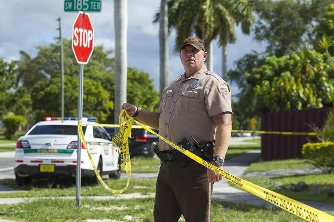 Miami-Dade police perimeter the area during a death investigation at the 8500 block of Southwest 185th Terrace on Saturday, July 4, 2017 in Cutler Bay.