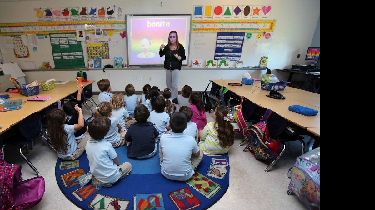 
Teacher Laura Castro teaches Spanish synonyms to her Kindergarten EFO class at Aventura Waterways K-8 School earlier this month.
