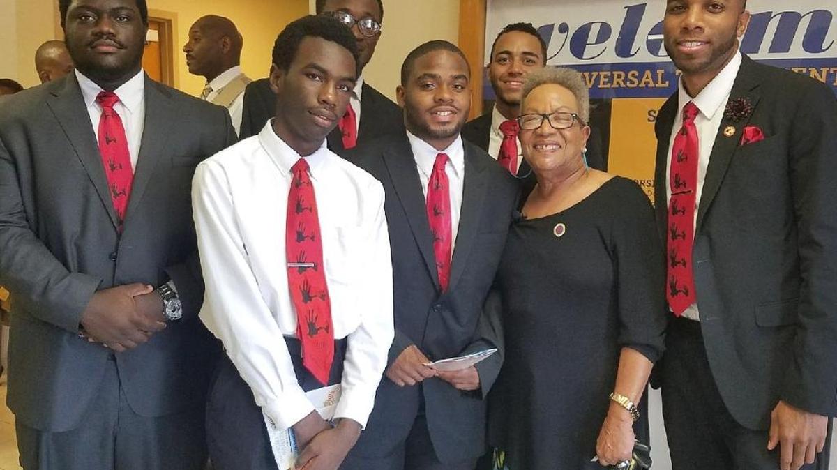 The 5000 Role Models of Excellence Project on June 11 celebrated Youth and Mentors Day at churches across South Florida. Pictured: Rico Rozier, Steven Ewell, Kevin Henry, Wayne Holmes, Jesus Morel, the Rev. Anna Price and Jamal Engram at of Universal Truth Center in Miami Gardens.