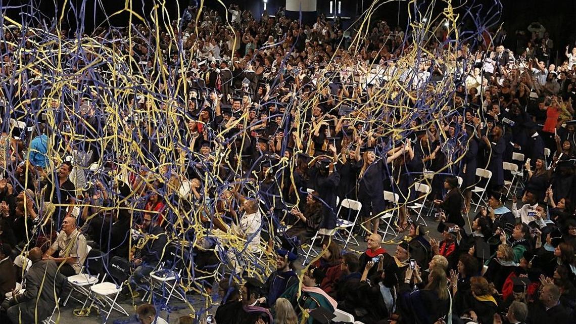 College graduation, such as for these FIU students, gets greeted with glee before the student loan payments start.
