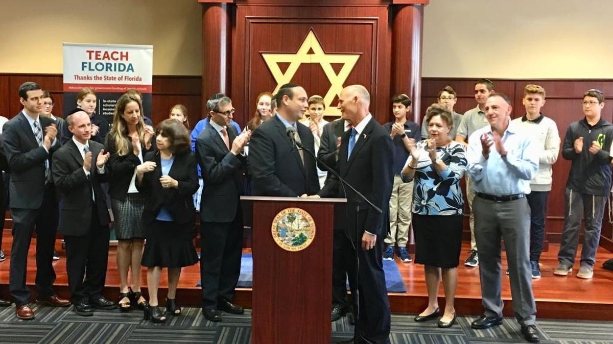 Speaking at Katz Hillel Day School of Boca Raton, Gov. Rick Scott announces a proposal to spend $1 million on security at Jewish schools.