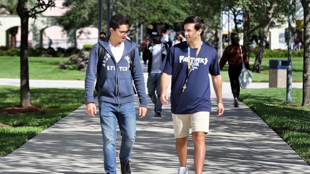 Childhood friends Ricardo Neco, 19, left, and Omar Jimenez, 20, who fled Puerto Rico after Hurricane Maria and started classes at Florida International University, on FIU campus on Wednesday, October 26, 2017.