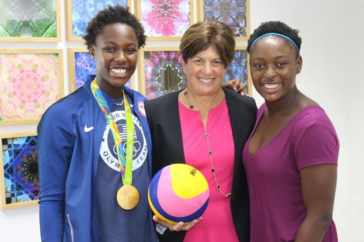 Ransom Everglades School’s Head of School Penny Townsend poses with Ashleigh Johnson, left, and her sister Chelsea Johnson, in 2017. The Johnson sisters were teaching underserved students how to swim at the school’s Ansin Aquatic Center in Coconut Grove. Ashleigh, a 2012 graduate of Ransom, helped the U.S. Olympic women’s water polo team to a second straight gold medal at the 2021 Summer Games in Tokyo.