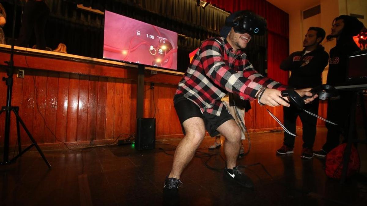 Coral Gables Senior High 12th grader Yosnel Alfonso plays with the Sugar Goggles.