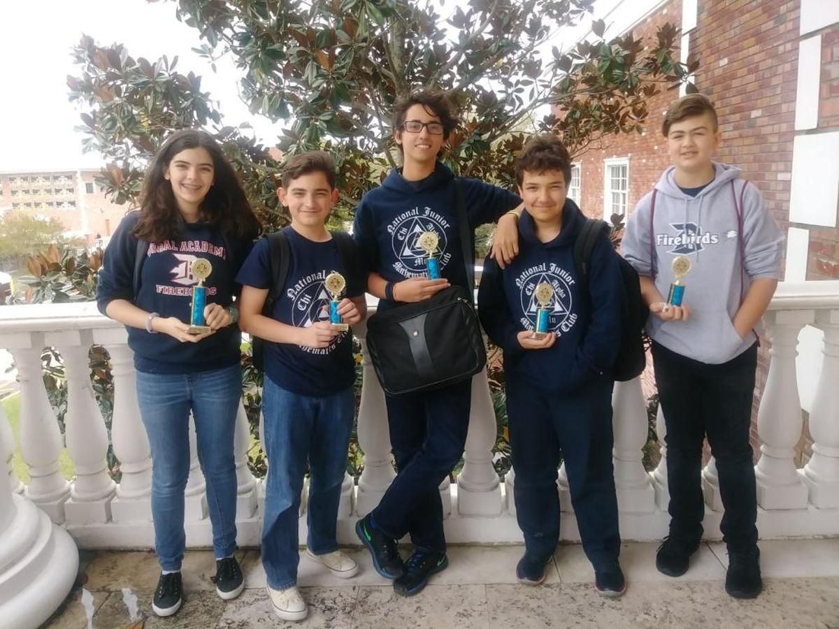 Amanda Miyares, Steven Diaz, Alberto Alvarez, Kevin Rodriguez and Luis Figueira of Doral Academy Preparatory School took home trophies after competing in the American Heritage Fall Junior High Math Invitational.
