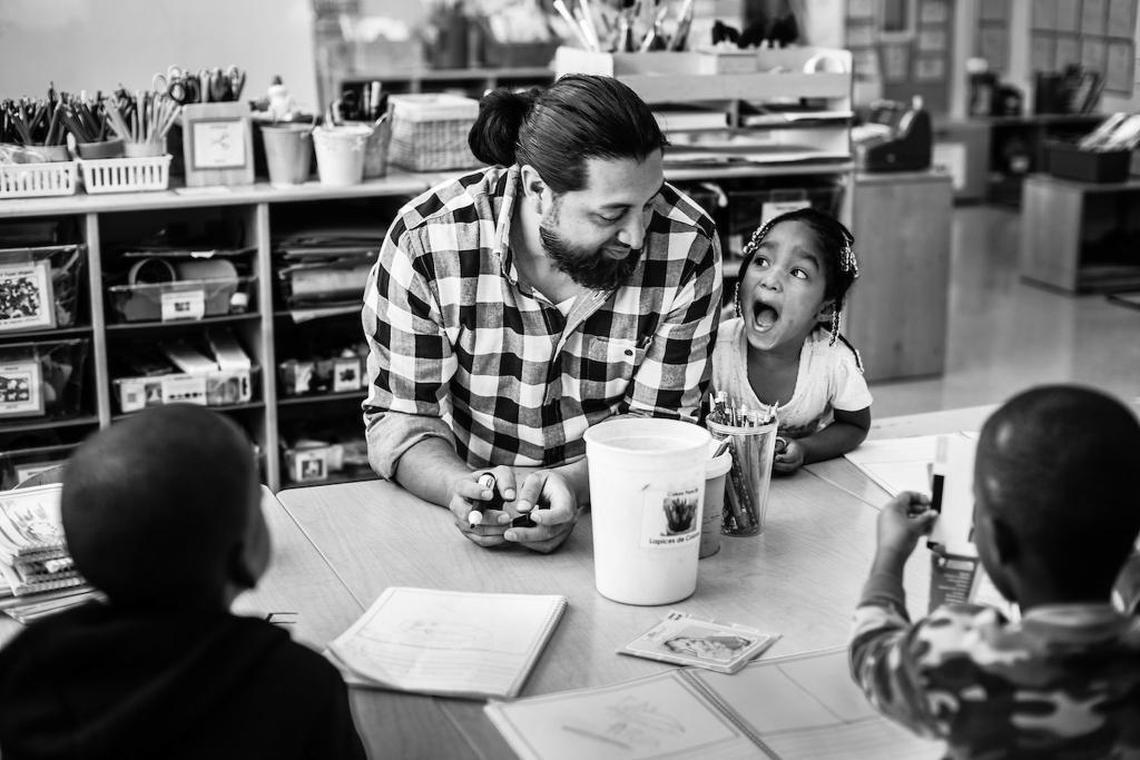 Exploration Station teacher Alfredo “Mr. Fred” Paredes, center, is one of the few male teachers in early childhood development. At Exploration Station, he is currently the only man. Students need to see themselves modeled at school, and male teachers add to a more diverse and dynamic environment. Paredes’ gentle manner is well received, and their excitement is evident, even before breakfast is served. Student Gabriana Gonzalez, right, reacts with excitement from the instruction from Paredes. According to the Early Learning Coalition of Miami-Dade/Monroe: “Trust and teaching go hand in hand. Male role models are important for preschoolers, yet only 1 in 100 teachers are male.”