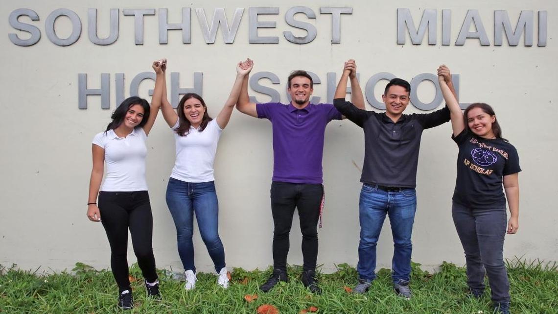 From left, Yen Yi-11th grader-16, Beatriz Oliva-12th grader-17, Edgar Ferreiro-11th grade-17, Johan Morales- graduated-19 and Sabrina Macias-12th grader-17, all received a perfect score on an Advanced Placement exam and are all students at Southwest Miami High School. Monday October 31, 2016