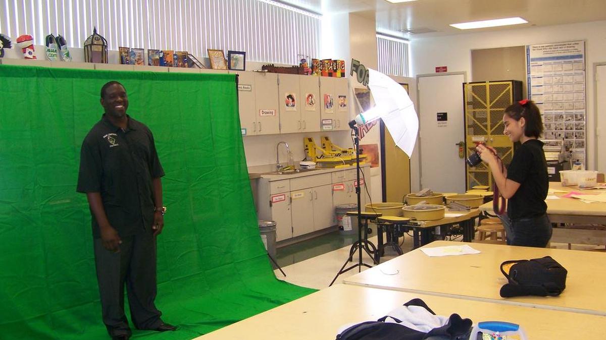 Miami Central Senior students in teacher Anais Young’s class use a green screen she purchased thanks to donations on DonorsChoose.Org.
