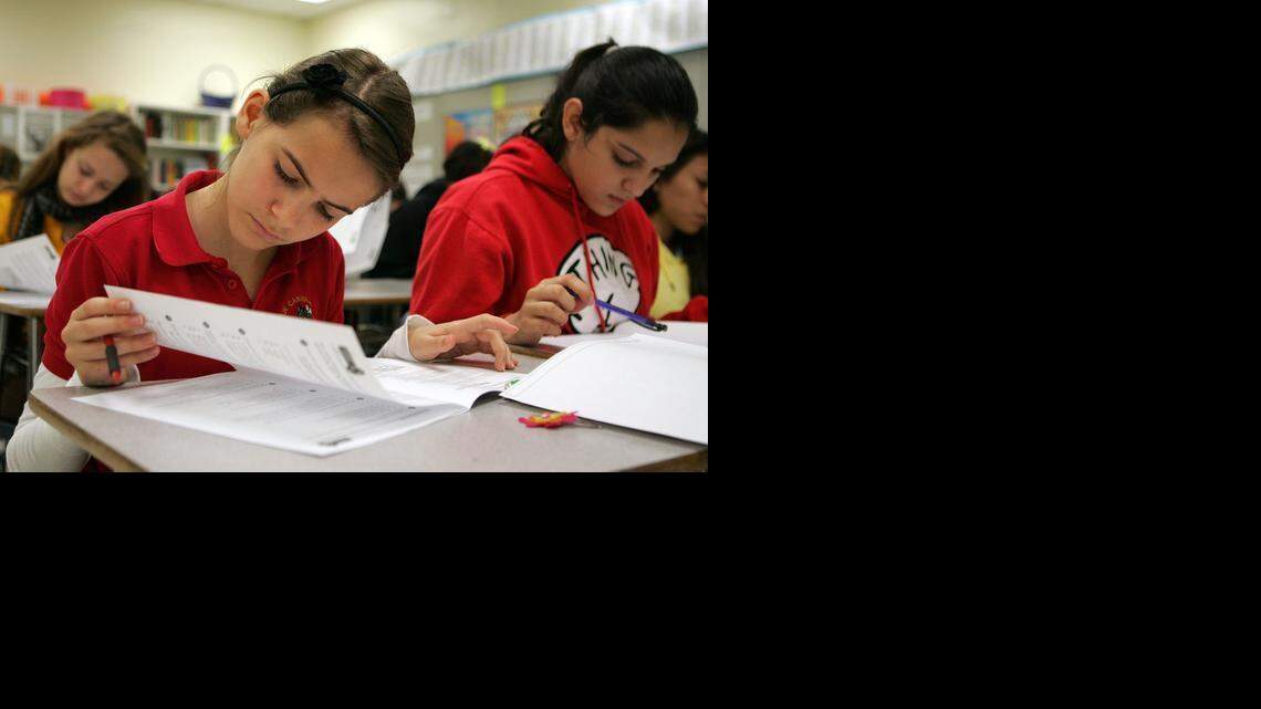 
Language arts students at Carver Middle School in Miami-Dade County prepare for the state assessments. Across Florida, parents are pushing back on standardized tests. Some say schoolchildren are taking too many exams. Others have concerns about the quality of the tests, and the way the results are being used.

