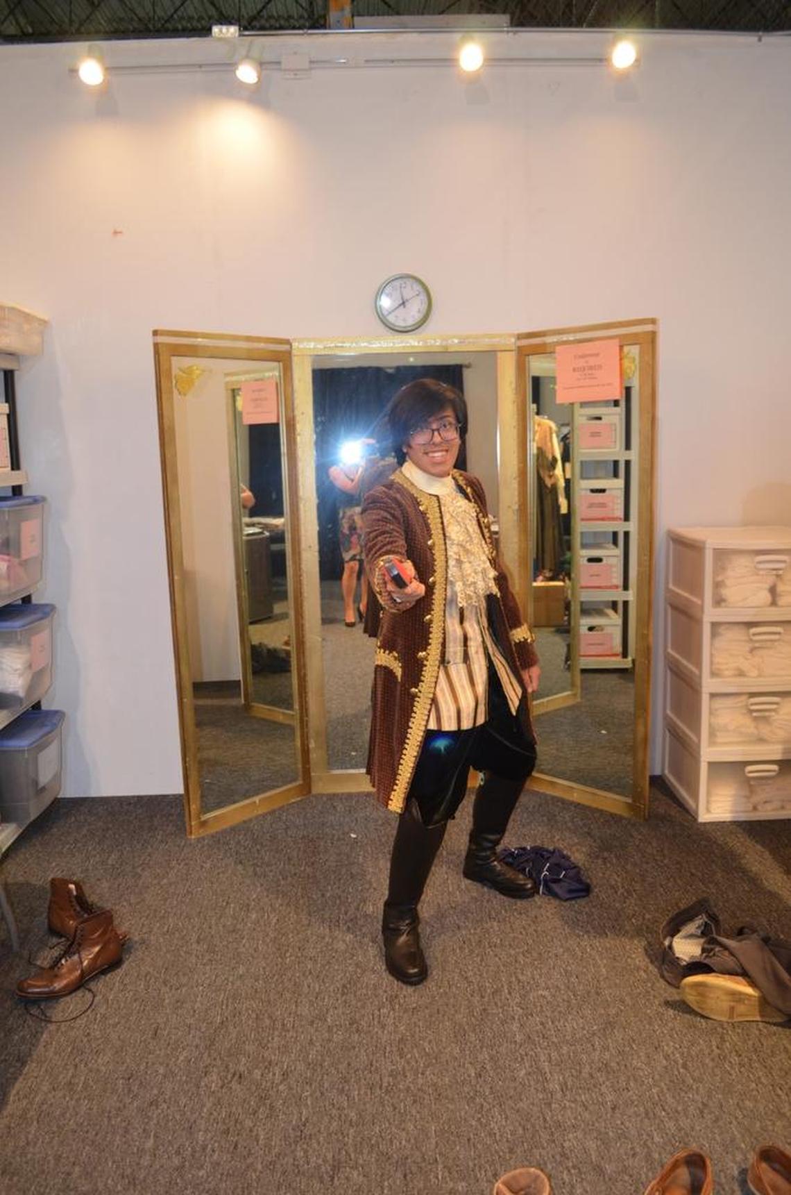 Youth Artist Learning Academy student Javmar Perez-Contreres in a costume fitting. Javmar is a very gifted pianist, in addition to being interested in the theater.
