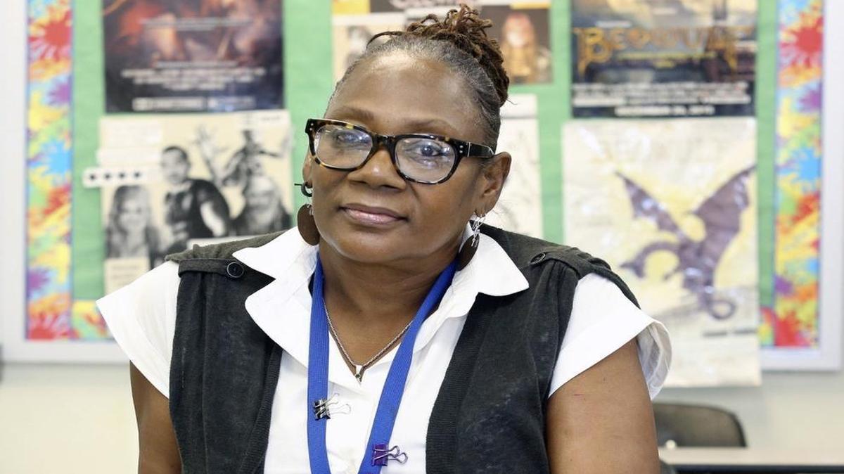 Ceresta Smith sits in her language arts classroom at John A. Ferguson Senior High School on Thursday, April 21, 2016.