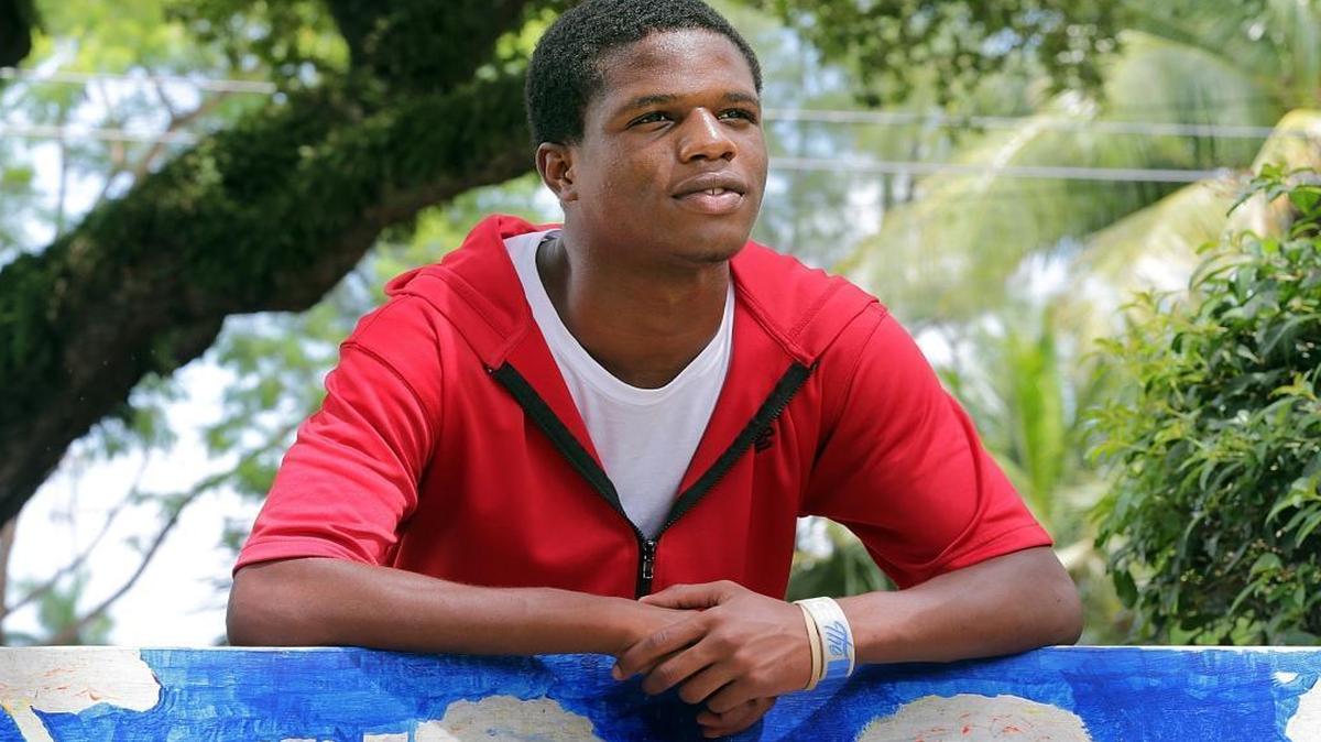 Kris Pullock, a homeless student at Miami Bridge Youth & Family Services, poses on the patio during a break on Sept. 14, 2016.