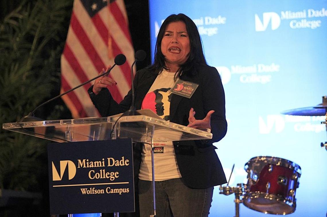 In a July 22, 2017, file photo, Karla Hernandez-Mats, president of United Teachers of Dade, speaks during the March for Public Education. Leaders of local teachers unions in Florida say a proposed rule tucked into a massive education bill making its way through the Legislature could expose public school teachers to major pay cuts and job losses.