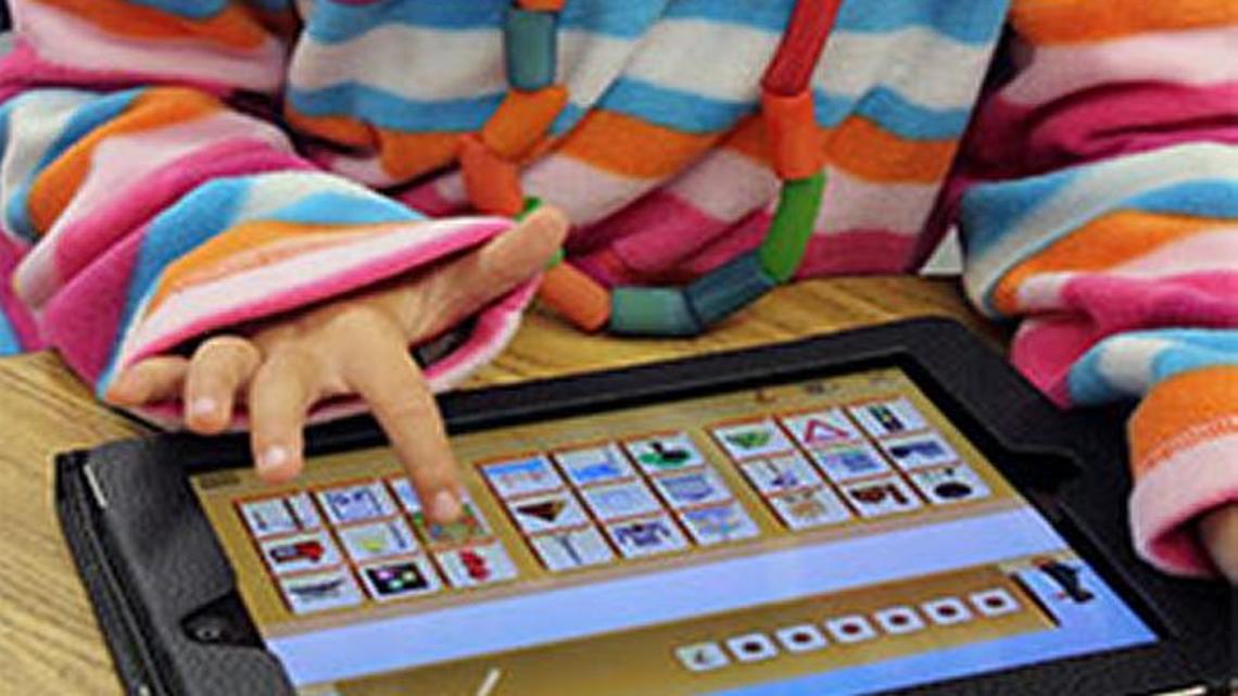 
A child plays ST Math on a tablet computer.
