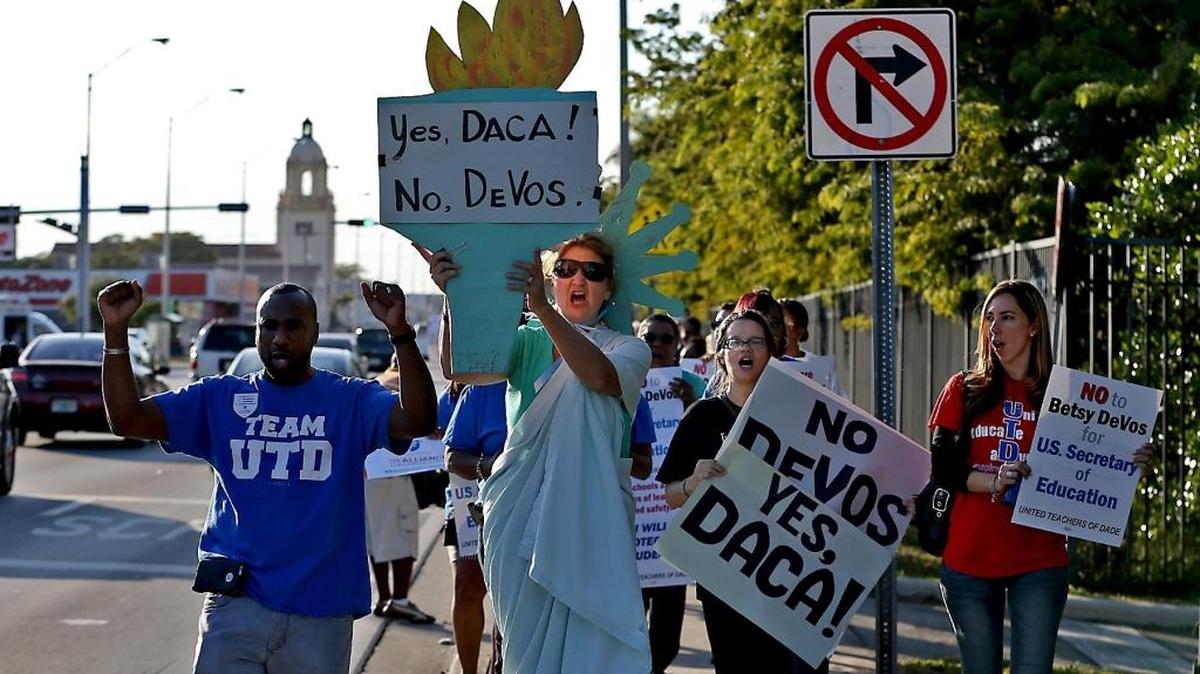 Chris Kirchner, an English teacher at Coral Reef High School, dressed like Lady Liberty to join the United Teachers of Dade protest Thursday. The union took part in a nationwide protest calling on the Senate to reject Betsy DeVos as secretary of education.