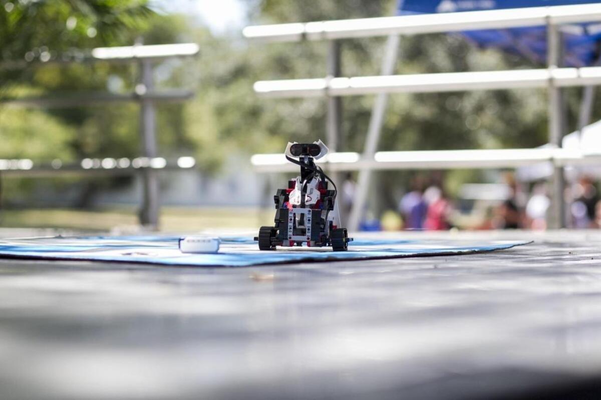 The robot Watermelon picks up a block during a STEM Summer Camp presentation at Cutler Ridge Park on Saturday, Aug. 12, 2017.
