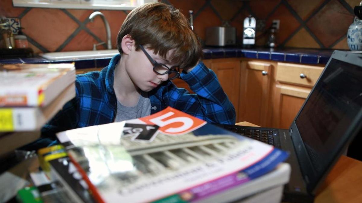With the start of school on Monday, this photo illustration captures the soon-to-be future for many Miami-Dade students, whose heads are about to be again buried in homework.