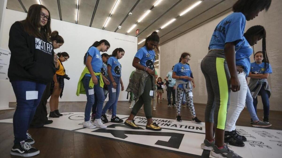 Teenagers from Breakthrough Miami explore the artwork ‘Out Of Sight’ at the Peréz Art Museum Miami on Feb. 25, 2017.
