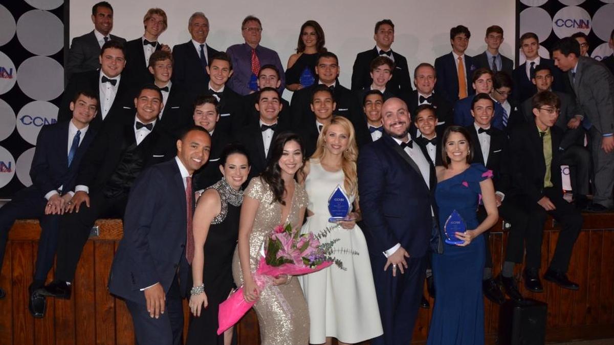 After the awards were presented, some of the winners pose with students from Christopher Columbus High School’s CCNN Live news organization.